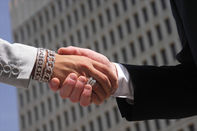 Shot for stock photography. Male and female shaking hands while in business attire showing agreement or concluding a deal.

Click to enlarge photo